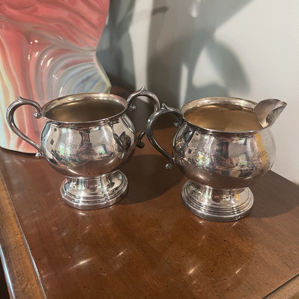 FB Rogers Silver Co Creamer and Sugar Bowl in silver on‎ copper